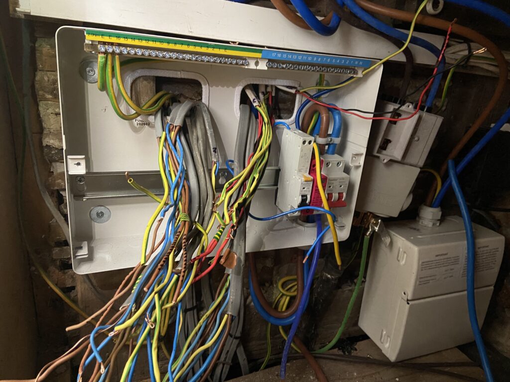 Consumer unit rewiring during fuse board upgrade, London