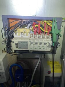 Old fuse board with an RCD that trips immediately after reset during electrical fault finding