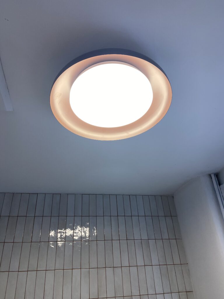 LED ceiling light installed in bathroom, Acton home