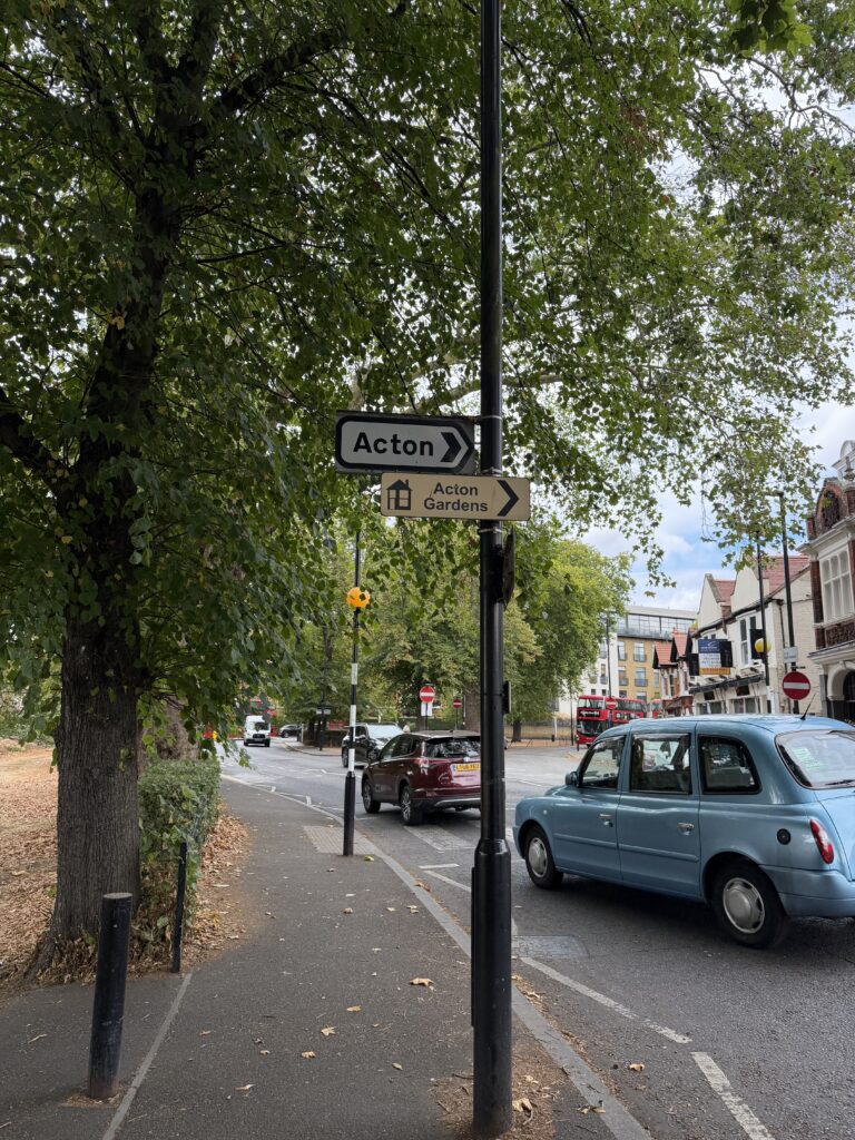 Acton street sign in West London, service area for our electricians in Acton