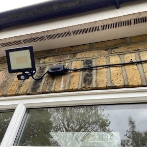 Outdoor LED security floodlight installed by a local electrician in Chiswick